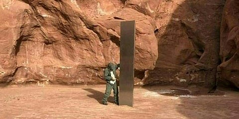 A mysterious metal monolith that was discovered in Utah after public safety officers spotted the object while conducting a routine wildlife mission. (Photo| AFP)