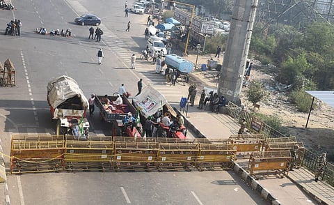 Farmers protesting at Delhi Uttar Pradesh border near Ghazipur in New Delhi on Sunday. (Photo | Parveen Negi, EPS)