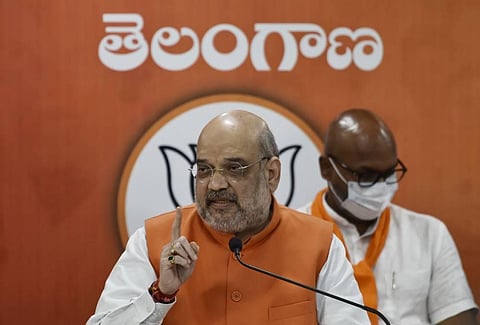 Union Home Minister Amit Shah addresses a press conference at Shyam Prasad Mukheerji Bhavan on Sunday in Hyderabad. (Photo | Vinay Madapu, EPS)