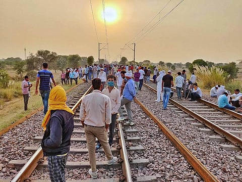 Gujjar community people block railway tracks during their agitation for reservation in jobs and edication at Pilupura village of Bharatpur district Sunday Nov. 1 2020. (Photo | PTI)