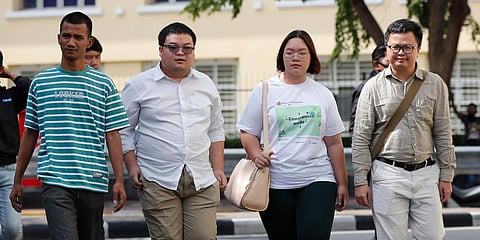 (From left) Pro-democracy activists Panupong Jadnok, Parit Chiwarak, Panusaya Sithijirawattanakul and Arnon Nampha arrive at Chana SongKhram police station in Bangkok. (Photo| AP)