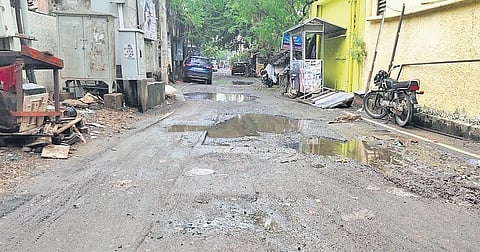 A damaged interior road in Vadapalani.