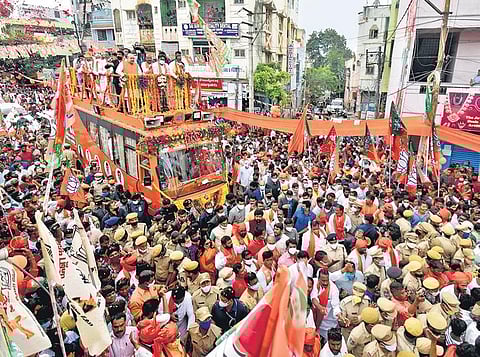Union Home Minister Amit Shah holds a roadshow in Hyderabad’s Warasiguda on Sunday as part of BJP’s campaigning for the December 1 GHMC election. (Photo | S Senbagapandiyan, EPS)
