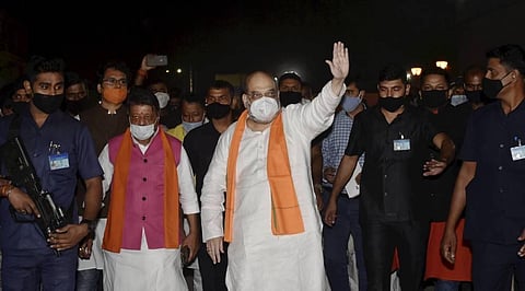 Union Home Minister Amit Shah waves as he arrives at NSCBI Airport in Kolkata Wednesday Nov. 4 2020. (Photo | PTI)