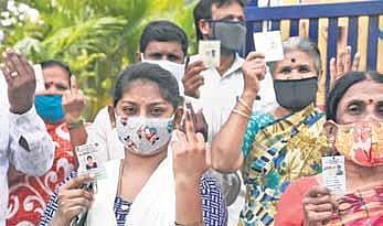 Voters show their inked fingers after casting their ballot for bypolls to the RR Nagar assembly seat, in Bengaluru on Tuesday | Nagaraja Gadekal