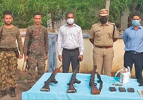 Arms and ammunition recovered from Maoists on display | Express