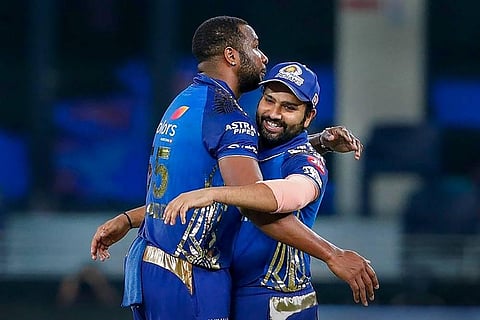 Rohit Sharma and Kieron Pollard of Mumbai Indians celebrate their win over Delhi Capitals in the Qualifier 1 match at the Indian Premier League. (Photo | PTI)