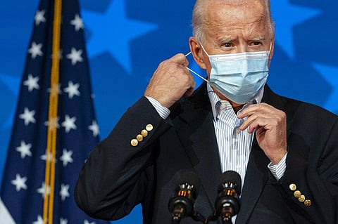 Democratic presidential candidate former Vice President Joe Biden removes his face mask to speak at The Queen theater, Thursday, Nov. 5, 2020, in Wilmington. (Photo | AP)