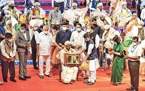 CM BS Yediyurappa, outgoing Kannada and Culture Minister CT Ravi and others hand over Rajyotsava awards.