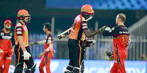 Sunrisers Hyderabad batsmen Jason Holder and Abdul Samad after winning a match against Royal Challengers Bangalore during the IPL at Sharjah Cricket Stadium. (Photo | PTI)