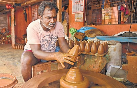 A potter at work at Kotturutadepalli. (Photo | Prasant Madugula, EPS)