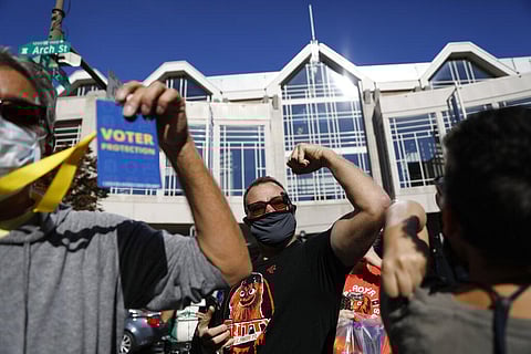 People celebrate outside the Pennsylvania Convention Center after Democrat Joe Biden defeated President Donald Trump. (Photo | AP)
