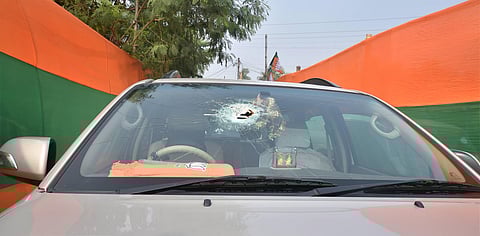 A vehicle of BJP National President JP Nadda's convoy damaged after stone-pelting by alleged TMC activists at Sirakal near Diamond Harbour. (Photo | PTI)