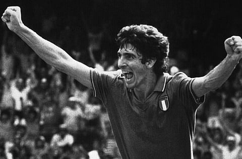 Italy's Paolo Rossi races across the pitch after scoring his team's first goal against Poland during the football World Cup Semi-final match in 1982. (Photo | AP)