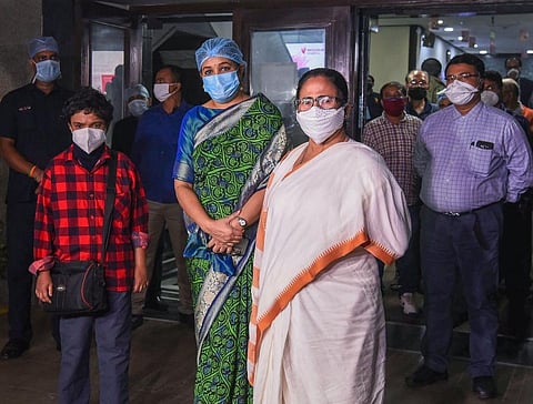 West Bengal Chief Minister Mamata Banerjee visits a private hospital to meet ailing former CM Buddhadeb Bhattacharya in Kolkata. (Photo | PTI)