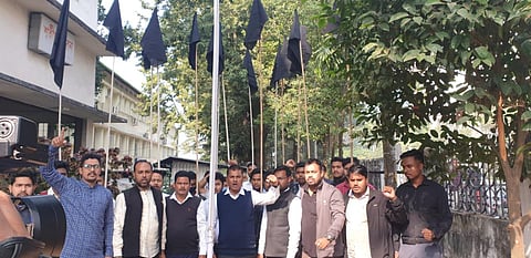 Black flags were hoisted and black banners displayed by the members of the All Assam Students' Union (AASU). (Photo | EPS)