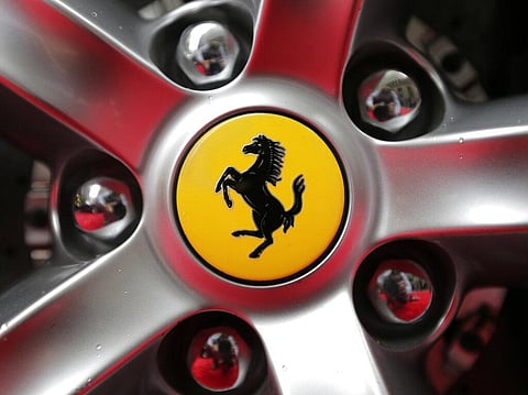 A Ferrari logo on a car outside the New York Stock Exchange (File photo | AP)