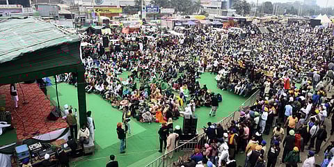 Farmers at Singhu border during their Delhi Chalo protest march against the Centres new farm laws in New Delhi on Friday. (Photo | EPS/Parveen Negi)