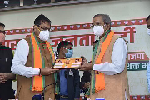 State BJP president Satish Poonia (L) and Ghanshyam Tiwari at BJP office in Jaipur on Saturday. (Photo | EPS)