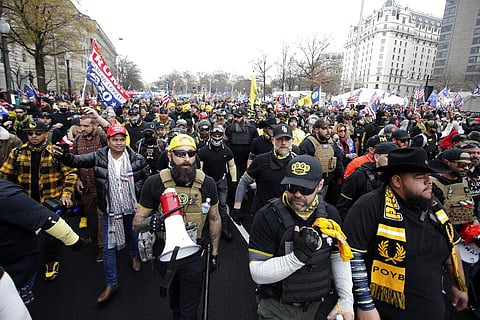 Supporters of President Donald Trump who are wearing attire associated with the Proud Boys attend a rally at Freedom Plaza. (Photo | AP)