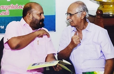 R Heli with Kerala agriculture minister VS Sunil Kumar. (Photo | Facebook/Adv. V S Sunil Kumar)