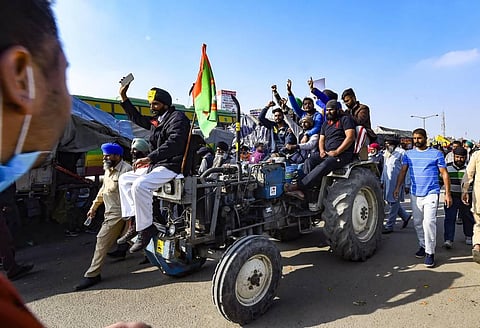 Farmers protest against the new farm laws at Singhu border in New Delhi Sunday Dec 13 2020. (Photo | PTI)