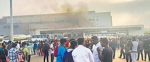 A file picture of Wistron employees going on rampage