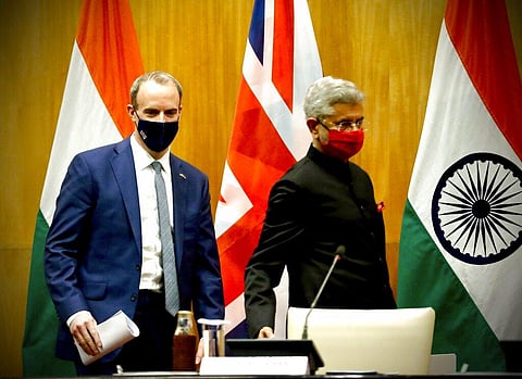 British Foreign Secretary Dominic Raab, left and Indian Minister of External Affairs Subrahmanyam Jaishankar arrive to make joint press statements after their meeting in New Delhi. (Photo | AP)