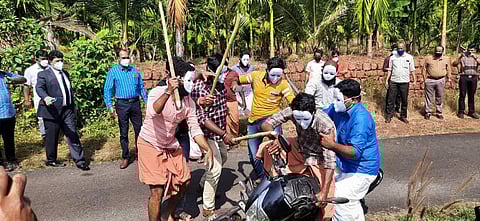 High drama: The CBI re-enactment of the Periya double murder was done with masks firmly in place. (Photo | EPS)