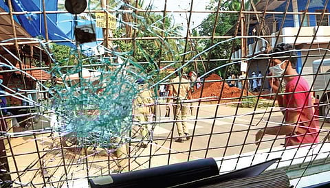 A police vehicle damaged in attack by IUML activists at Nadapuram | T P Sooraj