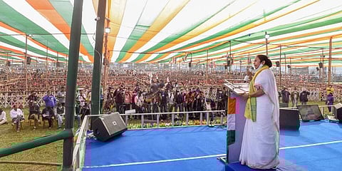 West Bengal Chief Minister Mamata Banerjee addresses a public meeting at Jalpaiguri district Tuesday. (Photo | PTI)