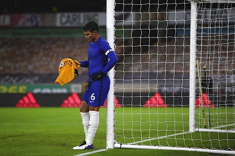 Chelsea's Thiago Silva holds a Wolverhampton t-shirt after the end of the English Premier League football match at the Molineux Stadium in Wolverhampton, England. (Photo | AP)