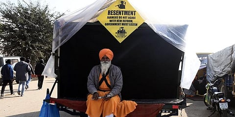 A farmer at Singhu Border during their Delhi Chalo protest march against the new farm laws on Monday. (Photo | Parveen Negi, EPS)