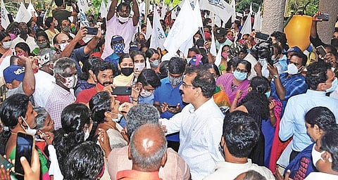 Twenty-20 founder Sabu Jacob distributing sweets among party workers after winning three more civic bodies while retaining Kizhakkambalam panchayat. (Photo | A Sanesh, EPS)