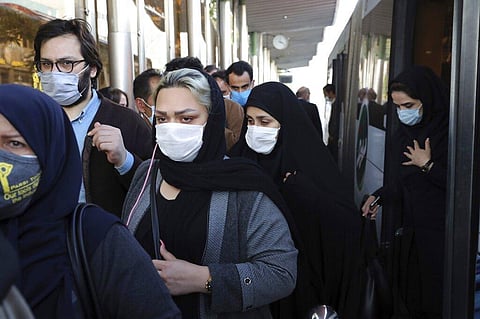 People wear protective face masks to help prevent the spread of the coronavirus in downtown Tehran, Iran. (Photo | AP)