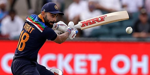 India skipper Virat Kohli plays a shot against Australia during their ODI match at Manuka Oval in Canberra. (Photo | AP)