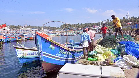 Fishermen take their boats to safety at Vizhinjam following the cyclone warning issued by the IMD. (Photo | Vincent Pulickal, EPS)
