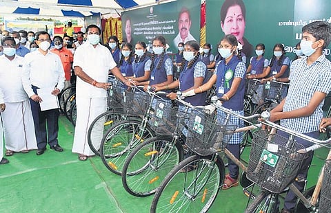 Chief Minister Edappadi K Palaniswami distributing bicycles to school students at his constituency in Salem district on Saturday