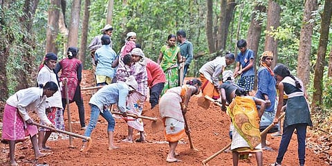 Villagers carry out road-laying work near Terali village in Uttara Kannada | d hemanth