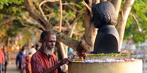 Sivadasan adorns the statue of APJ Abdul Kalam with flowers. (File Photo | A Sanesh, EPS)