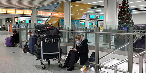 With many countries cancelling flights from and to UK, Passengers wait at Gatwick Airport in West Sussex. (Photo| AP)