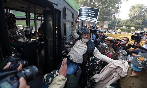 Police detain Indian Youth Congress activists who were staging a protest near the Krishi Bhawan. (Photo | Shekhar Yadav/EPS)