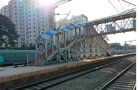 The skywalk connecting the existing FOB offers access to all the platforms at Whitefield railway station. (Photo | Express)