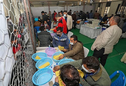 Counting of votes for the recently concluded District Development Council elections in progress at a centre in Jammu Tuesday Dec. 22 2020. (Photo | PTI)