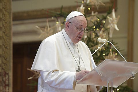Pope Francis delivers the Urbi et Orbi (Latin for 'to the city and to the world' ) Christmas' day blessing inside the blessing hall of St. Peter's Basilica, at the Vatican, Friday. (Photo | AP)