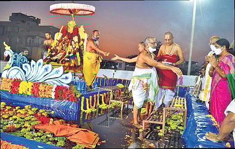 Devotees offer prayers to Lord Rama and Goddess Sita on the auspicious occasion of Teppotsavam, at Sri Sita Ramachandraswamy temple in Bhadrachalam on Thursday