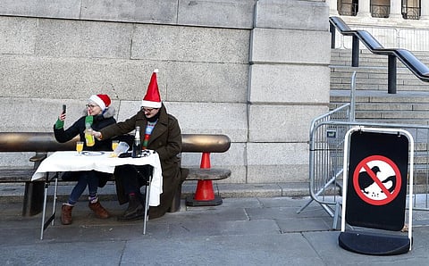 UK Prime Minister Boris Johnson has warned that tougher restrictions could be needed to keep a mutant coronavirus strain 'running out of control' in the New Year. (Photo | AP)