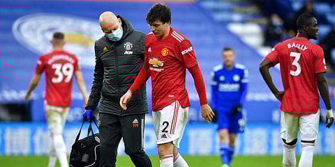 Victor Lindelof walks off injured during the English Premier League soccer match between Leicester City and Manchester United at the King Power Stadium. (Photo | AP)