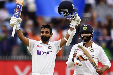 India's Ajinkya Rahane (L) celebrates scoring his century (100 runs) as teammate Ravi Jadeja (R) looks on during the second day of the second cricket Test match. (Photo | AFP)