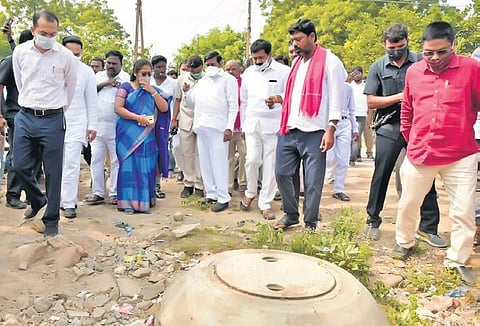 Energy Minister G Jagadish Reddy and Nalgonda Collector Prashant Jeevan Patil inspect a ward in Nandikonda town, Nagarjunasagar constituency, on Sunday.